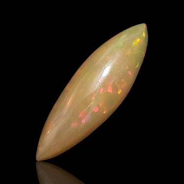 3Ct Natural Ethiopian Opal Cabochon. Size- approx. 22x7mm